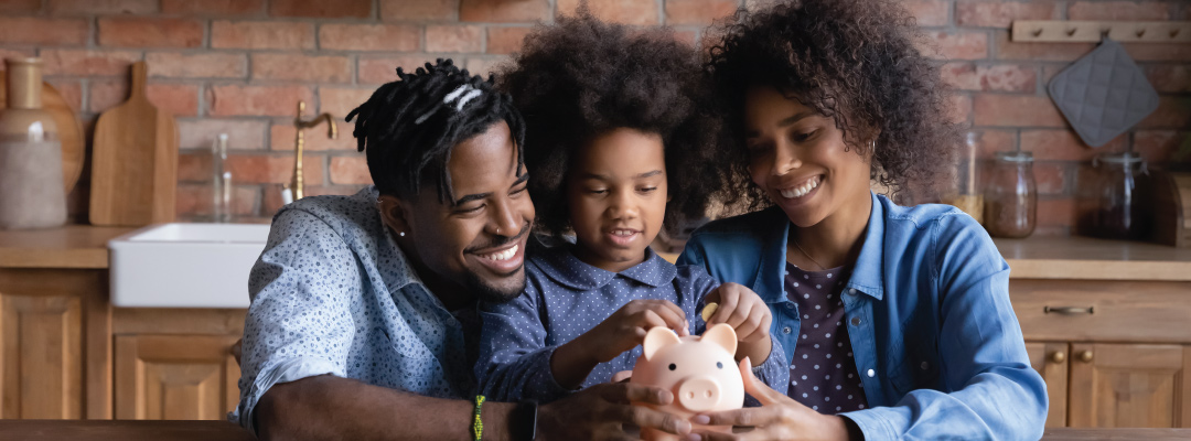 Family explain the importance of savings to their daughter
